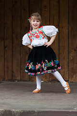 Image showing Dancing little girl acting on the stage