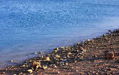 Image showing Sea Beach at Sunset. Sea Blue Water Background.