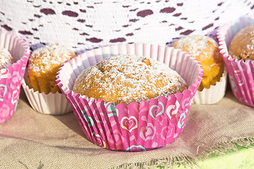 Image showing Mini cupcakes in colorful wrapper.