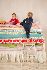 Image showing Children on the bed - Princess and the Pea.