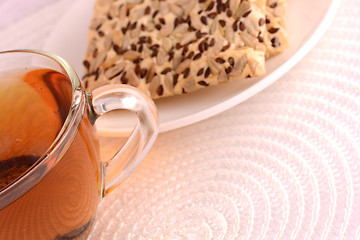 Image showing cup of tea (coffee) and some cookies 