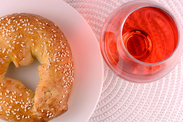 Image showing chocolate sweet cake on white plate and red wine