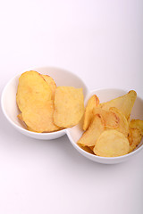 Image showing Potato chips on white bowl, close up