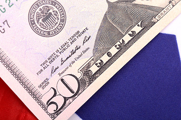 Image showing american dollars on american flag