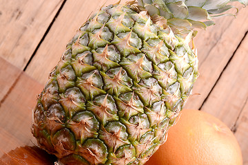 Image showing fresh pineapple with orange