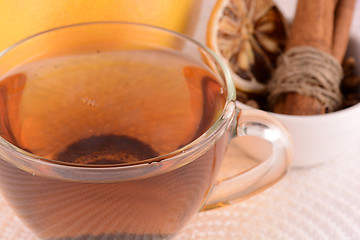 Image showing cup of tea (coffee) and old fruits