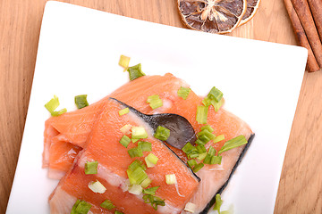 Image showing Slice of red fish salmon with cinnamon