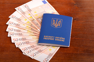Image showing ukrainian passport and one hundred euro banknotes