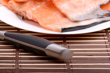 Image showing Fresh uncooked red fish fillet slices