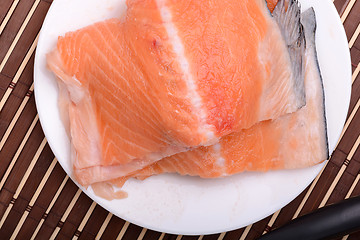 Image showing Fresh uncooked red fish fillet slices