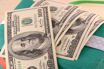 Image showing american money dollars and green gift box