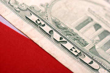 Image showing american dollars on american flag