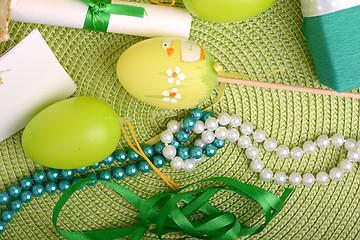 Image showing Easter background with eggs, ribbons and spring decoration