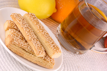 Image showing sweet cake on white plate and fruits