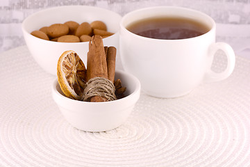 Image showing cup of tea (coffee), some cookies and old fruits