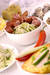 Image showing tasty salad and chicken chop on white plate