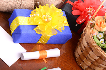 Image showing Flowers and gift box, holiday concept