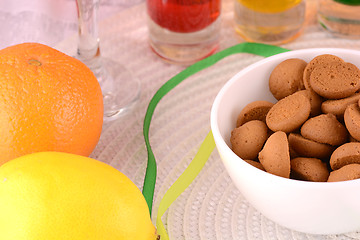 Image showing sweet cake on white plate and fruits