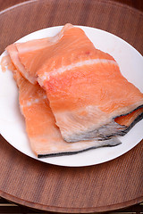 Image showing Fresh uncooked red fish fillet slices