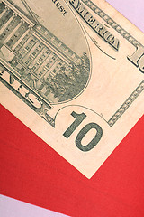 Image showing american dollars on american flag