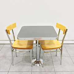 Image showing Table with two chairs in a cafeteria