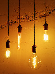 Image showing Light bulbs on concrete background