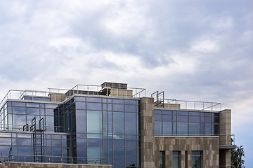 Image showing Glassy top of city high building