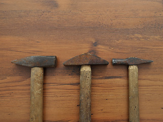 Image showing Hammer on wood