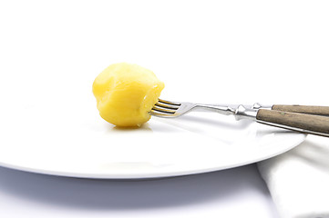 Image showing Peeled potato on table