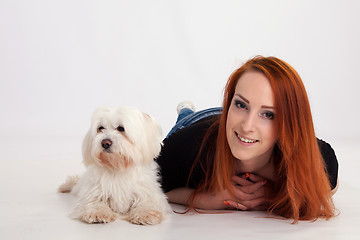 Image showing Young woman with her dog