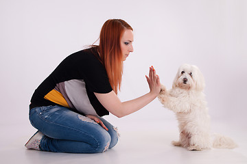 Image showing Young woman with her dog
