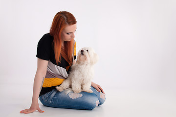 Image showing Young woman with her dog