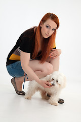 Image showing Young woman with her dog