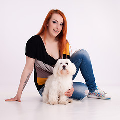 Image showing Young woman with her dog