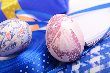 Image showing Easter background with eggs, ribbons and spring decoration