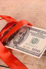 Image showing american money and red ribbon