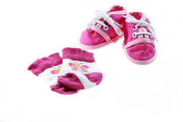 Image showing Pink baby shoes and socks isolated