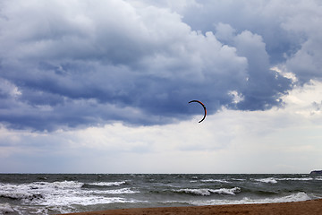 Image showing Power kite in sea and cloudy sky