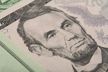 Image showing Macro of Abraham Lincoln on five USA dollar banknote