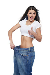 Image showing Young woman delighted with her dieting results