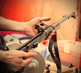 Image showing submachine gun MP-38 in the hands of a master