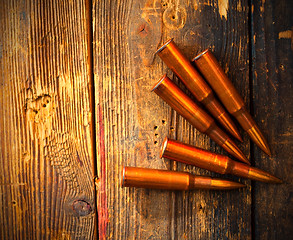 Image showing five rifle cartridges
