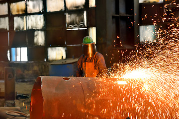 Image showing Welder uses torch