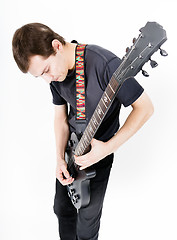 Image showing man with a black electric guitar