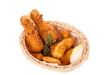 Image showing Crisp crunchy golden chicken legs and wings