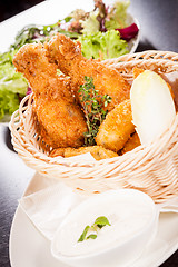 Image showing Crisp crunchy golden chicken legs and wings