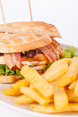 Image showing Club sandwich with potato French fries