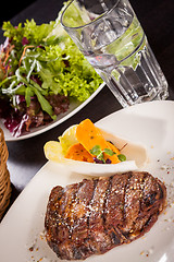 Image showing Grilled beef steak with seasoning