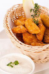 Image showing Crumbed chicken nuggets in a basket