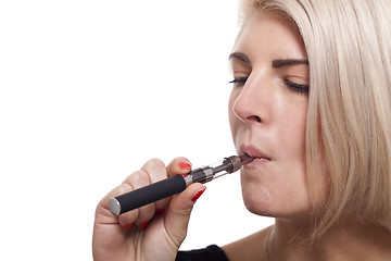 Image showing Close up Blond Woman Smoking Using E- Cigarette